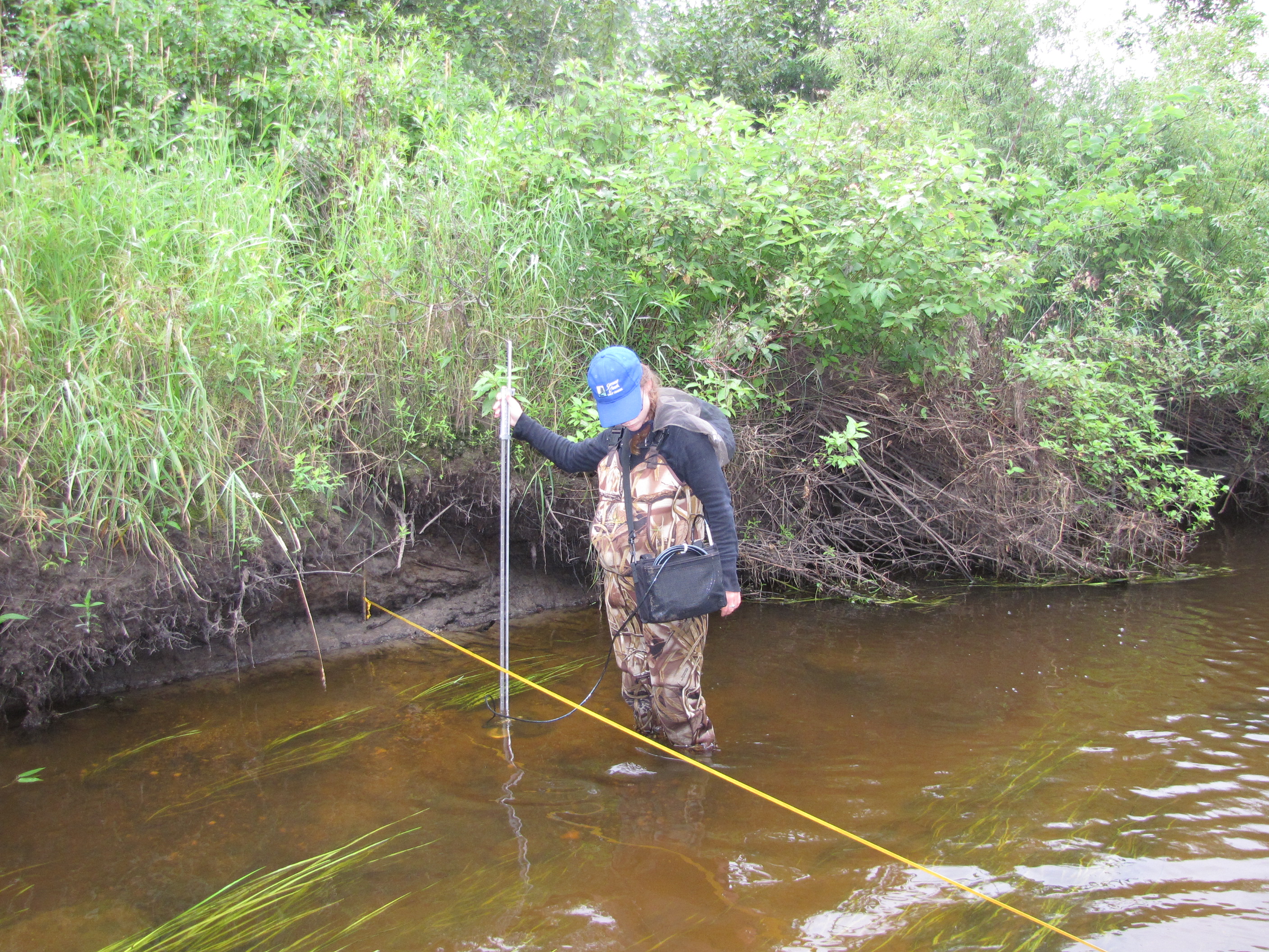 A Biologist manually collecting information about fish habitat. Photo Credit: Dennis Topp, Minnesota DNR, Baudette MN. 